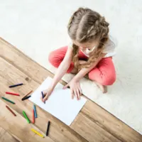 little girl coloring