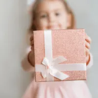 Girl holding a present