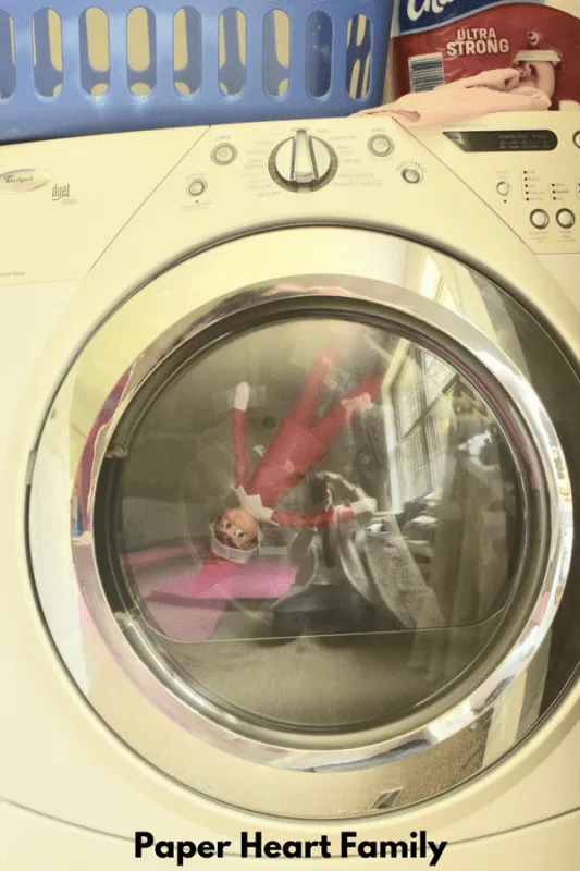 Elf on the Shelf in the dryer.