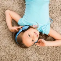 Young girl wearing headphones