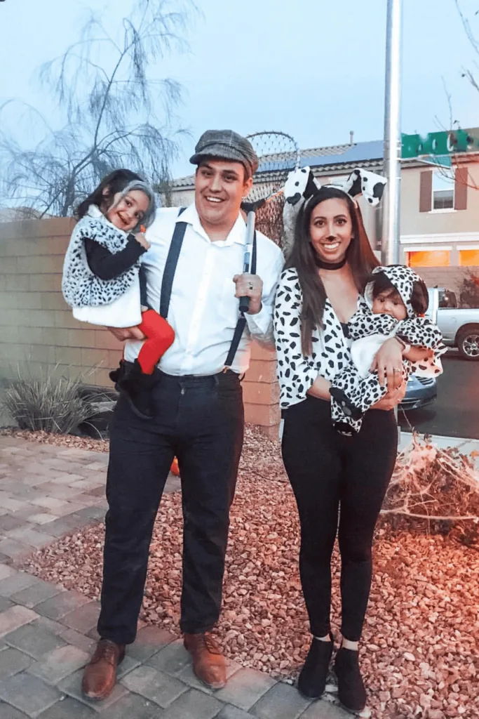 Dad as a dog catcher, mom and kids as dalmations