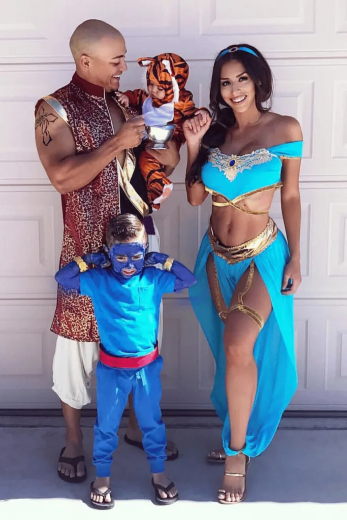 Mom as Jasmine, dad as Aladdin, baby as Rajah and boy as the genie