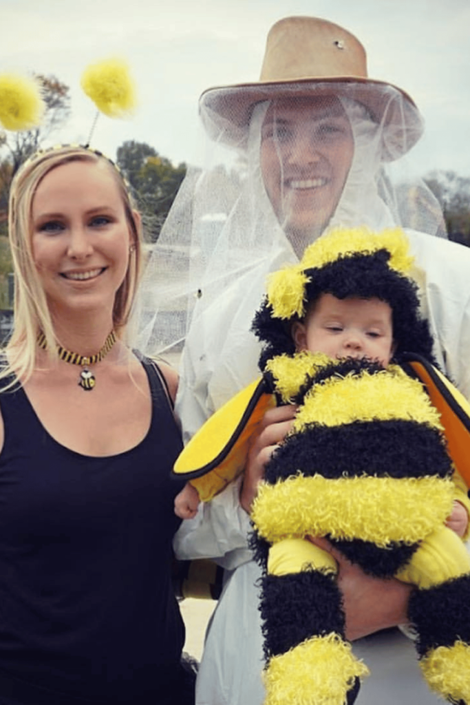Dad as a bee keeper, mom and baby as bees