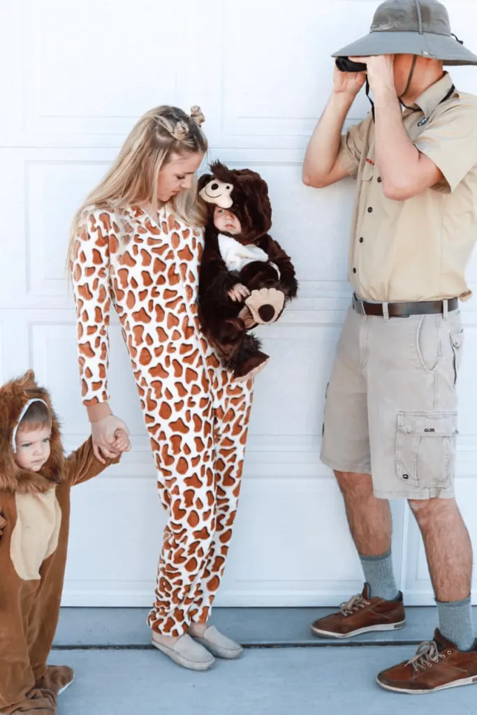 Father as sightseer on safari and mom and kids as wild animals