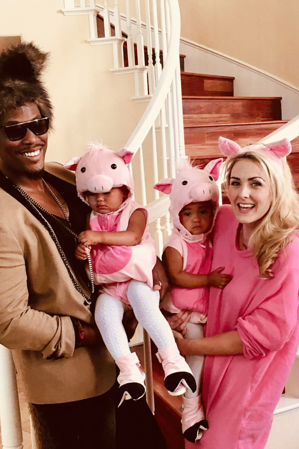 Dad as the lion, mom and twin babies as the three pigs