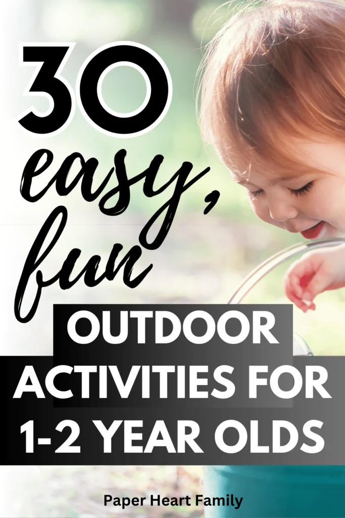 Toddler playing in water outside