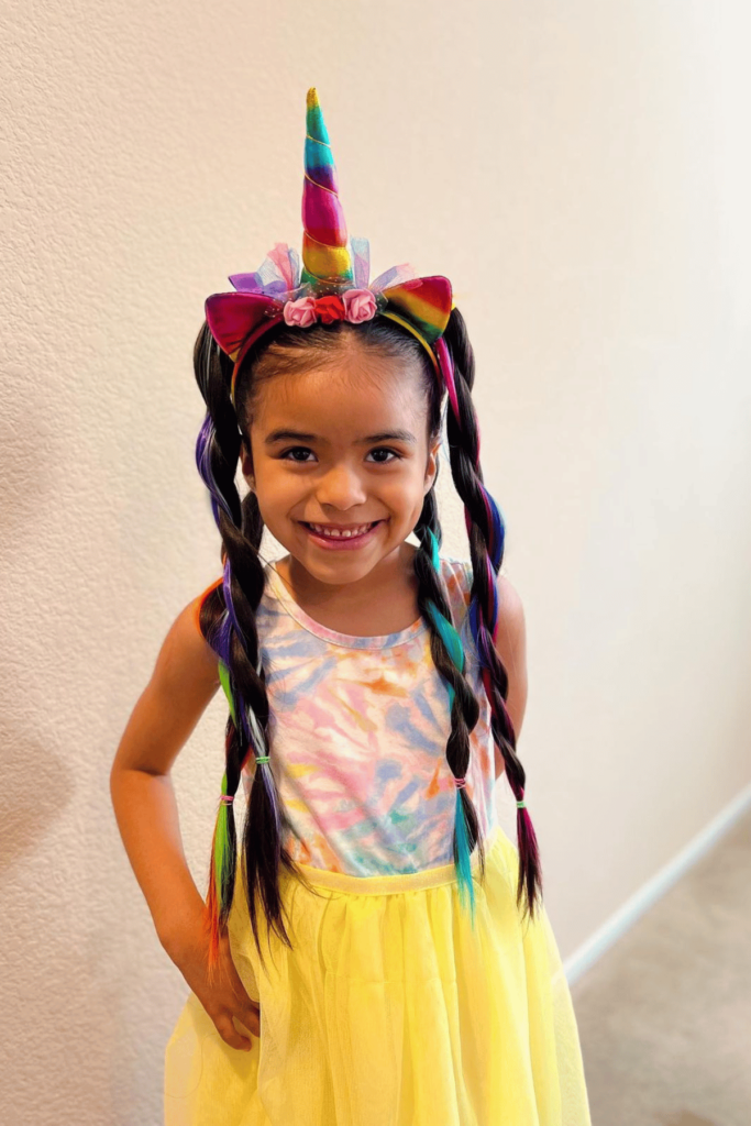 Unicorn headband with twisted hair pigtails