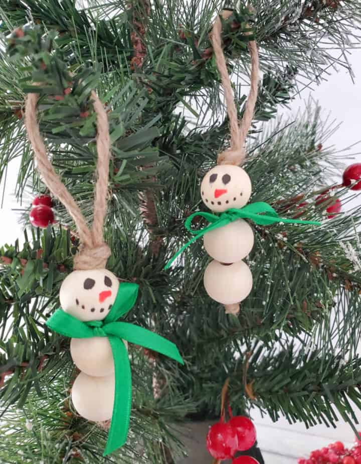 Snowman ornament made with twine, three beads and markers