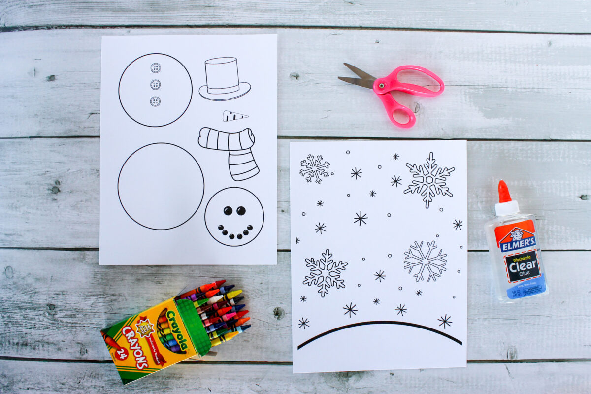 Snowman template, snowy background, scissors, glue and crayons