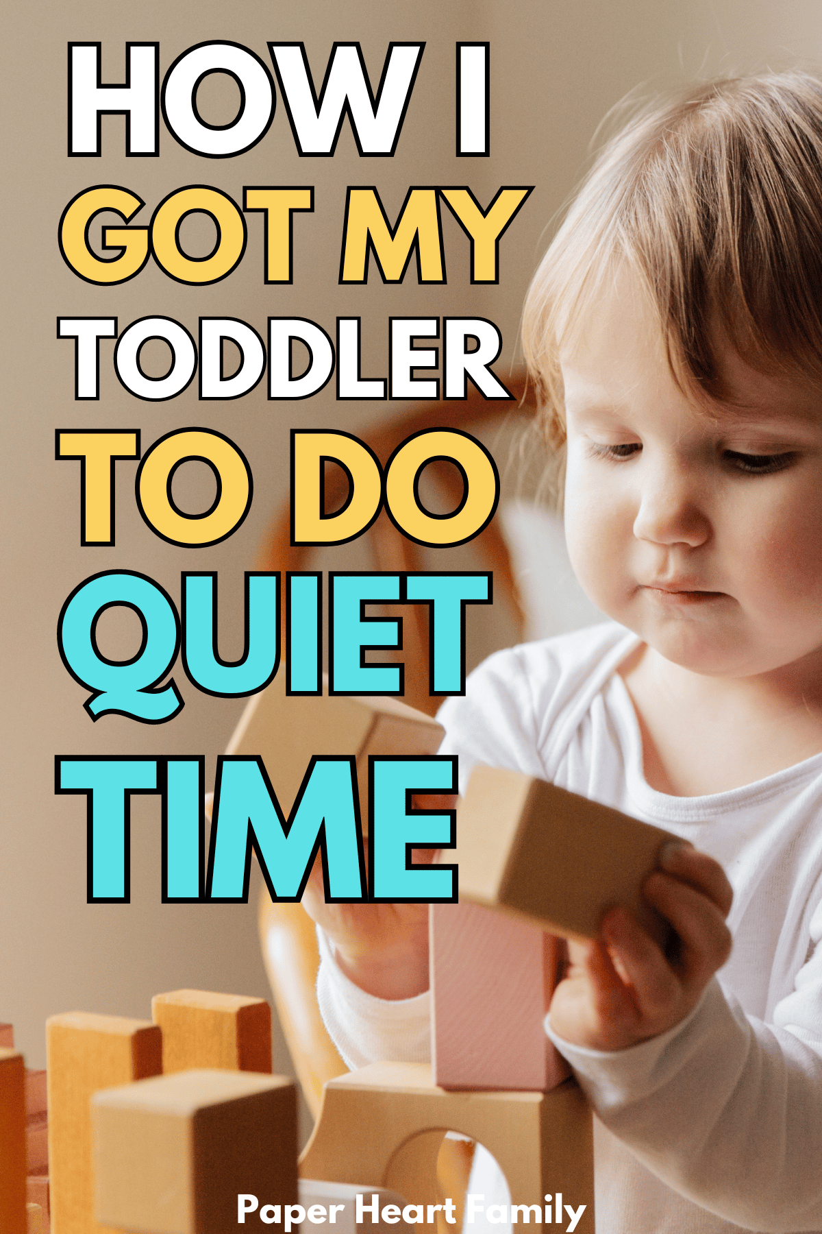 Toddler girl playing with blocks